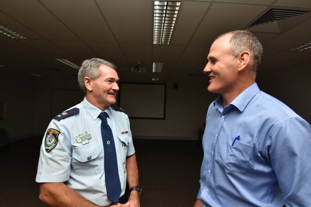 Comparing notes: Superintendent Paul Fehon and Port Macquarie-Hastings mayor Peter Besseling discuss the latest crime figures at this week's Community Safety Precinct Meeting.