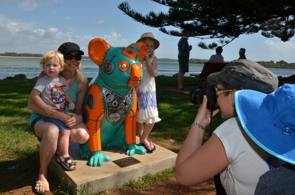 Natasha Drumond take of photo of Lucinda Blanch,holding Jack Drumond and Emily Blanch with koala