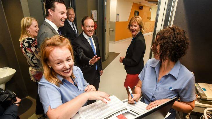 Greg Hunt laughs after two nurses said they were too busy to speak with him following his appointment as Health Minister. Photo: Justin McManus