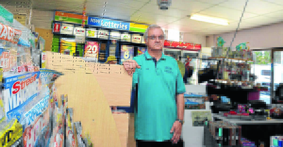Not happy: Joint owner of North Haven Newsagency and Lake Cathie News and Gifts Paul Heather feels local newsagents could be squeezed out by Coles and Woolworths.