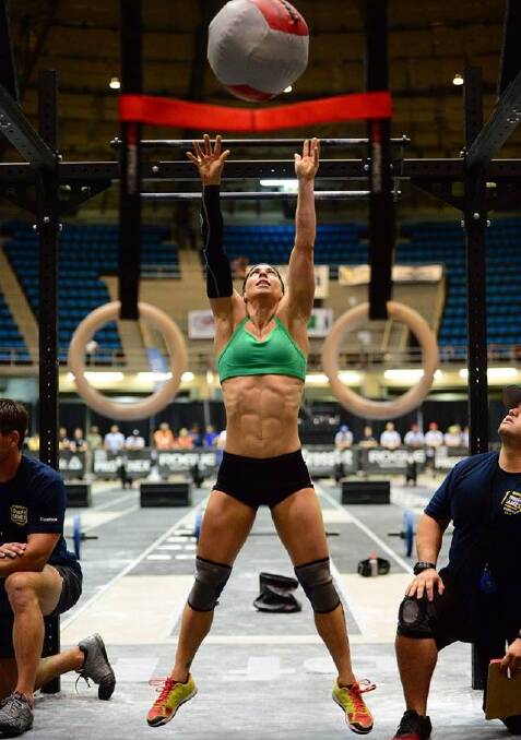Abs of steel: Amanda Schwartz completing a routine in the Crossfit Games.
Pic:  Brian Sullivan