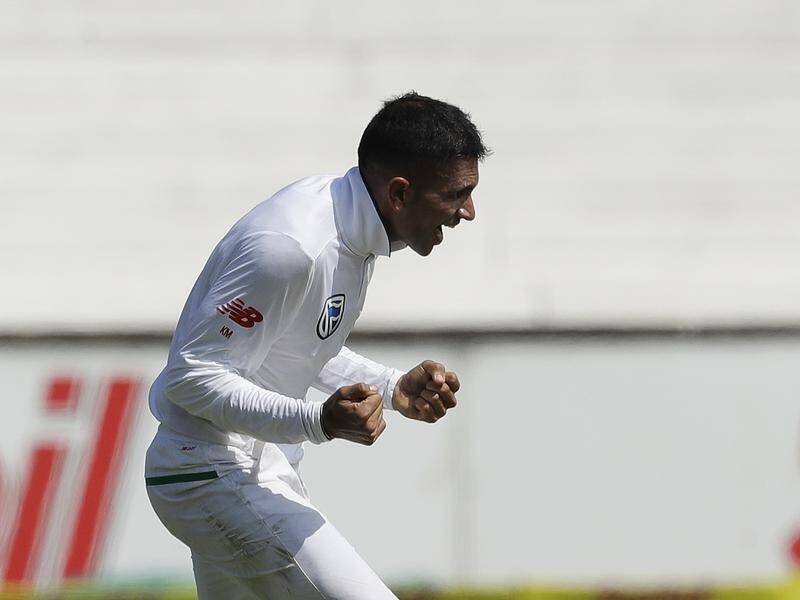 Keshav Maharaj celebrates dismissing Australia captain Steve Smith on day one of the first Test.