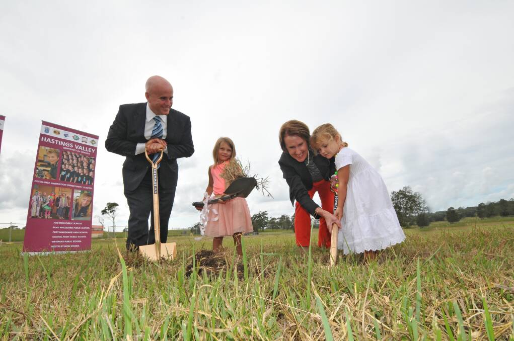 Turning the earth: Minister for Education Adrian Piccoli, 5-year-old Charli Collins, Port Macquarie MP Leslie Williams and Lelani Dietrich help turn the first sod at the new Lake Cathie School site.