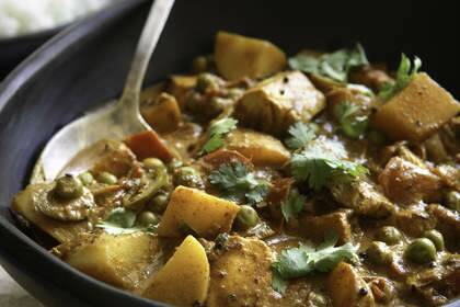 Terry Durack's kingfish, potato and pea curry <a href="http://www.goodfood.com.au/good-food/cook/recipe/kingfish-potato-and-pea-curry-20111018-29wnc.html"><b>(recipe here).</b></a> Photo: Marina Oliphant