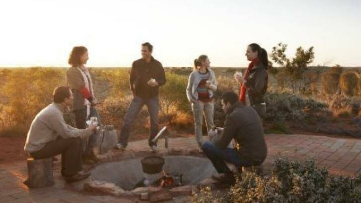 Watch the sunrise and have a bushman's breakfast on the Desert Awakenings tour.