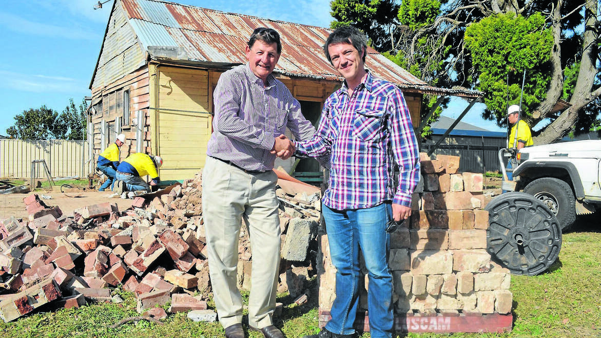 Cr Reg Kidd and ABC TV producer Max Mackinnon at the former site of Emmaville cottage. Photo: CLARE COLLEY