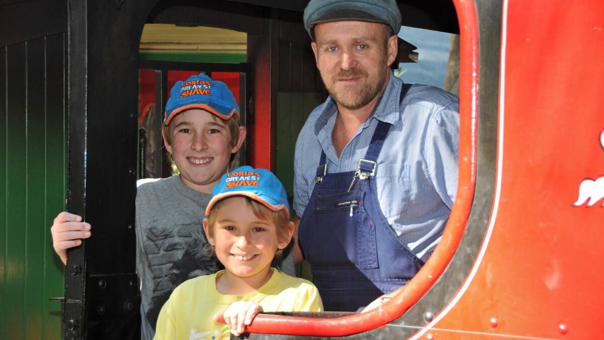 Vintage fun at the 2014 Timbertown Steam Festival for Xander and Calan Macrean with conductor Daryl Watson.. Pics MATTHEW ATTARD