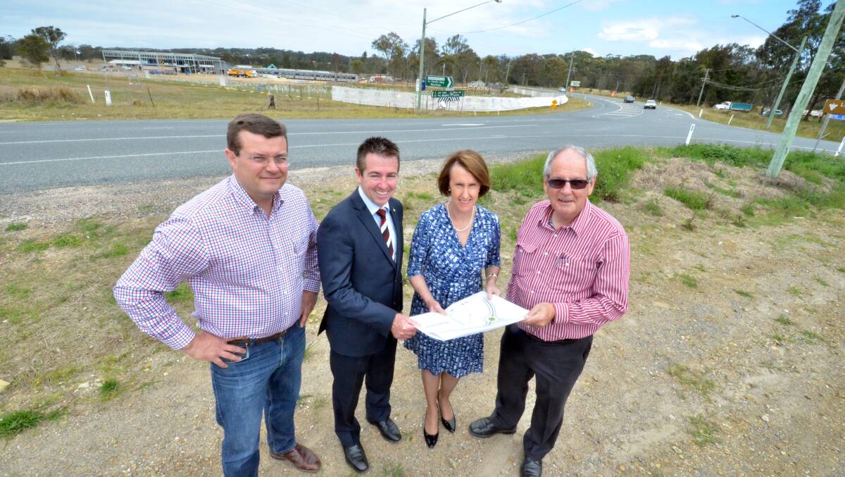 Safer roads: St Vincents Foundation project manager James Dunn, Local Government Minister Paul Toole, Port Macquarie MP Leslie Williams and a director with St Vincents Foundation, Peter Corcoran, look forward to the roundabout project.