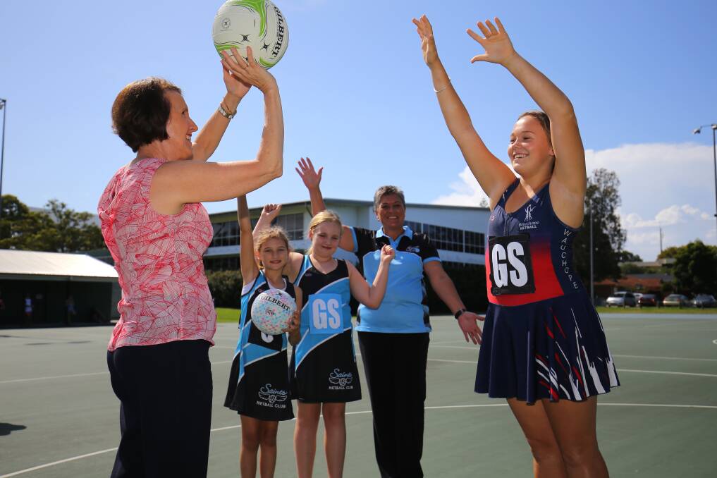 Funding score: Port Macquarie MP Leslie Williams shoots the ball while Piper Thompson from Wauchope Netball Club defends and Saints Netball Club members Hayley Purkis and Ella Harding, and Hastings Valley Netball Association president Helen Miles look on.
Pic: Ivan Sajko