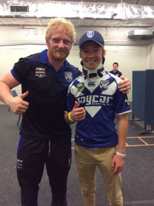 In high spirits: Curtis Landers, pictured here with his favourite NRL player James Graham, is back in Forster as he continues to recover from his horrific injury.
 Pic: Curtis Landers Road to Recovery Facebook page