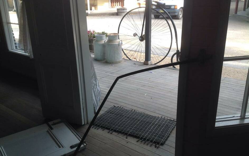 One of the doors forced open during the weekend's robbery. Pic: Timbertown Facebook.
