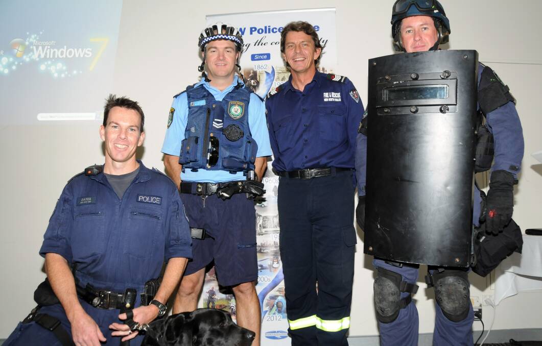 All on show: Senior Constables Matt Gates and Tim Williams caught up with Senior Firefighter Adam Scott-Young and Detective Senior Constable Richard Broomby and retired colleagues. 