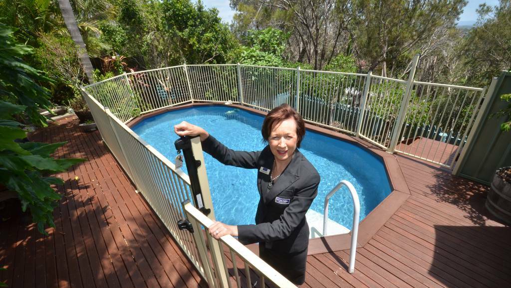 Property agent Michelle Percival urges all property owners planning on selling or leasing their home to ensure their backyard pools are compliant.