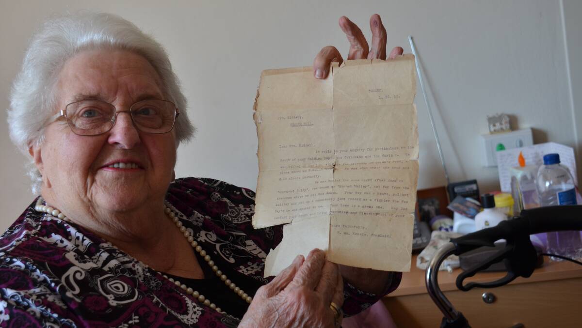 Marcelle Wilson with a letter sent to her great great grandmother Mrs Riddell from Turkey informing her of the death of her son in Gallipoli.