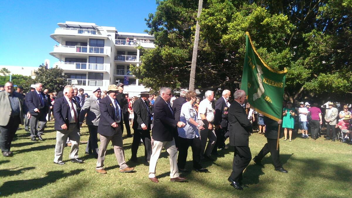 Vietnam veterans march to the Town Green for the commemorative service. Pic: Lisa Tisdell