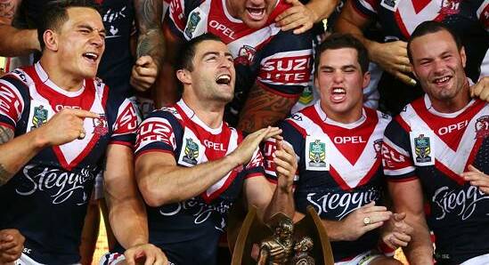 The Sydney Roosters celebrate winning the 2013 premiership. Who will hold the trophy this season?