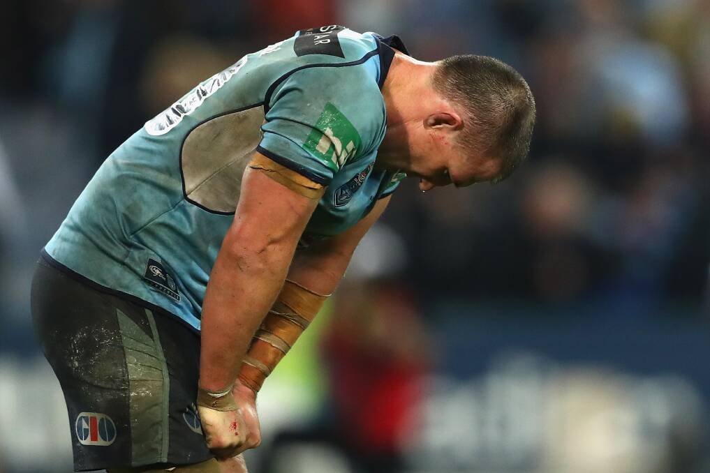 An exhausted Paul Gallen. Pic: Getty Images