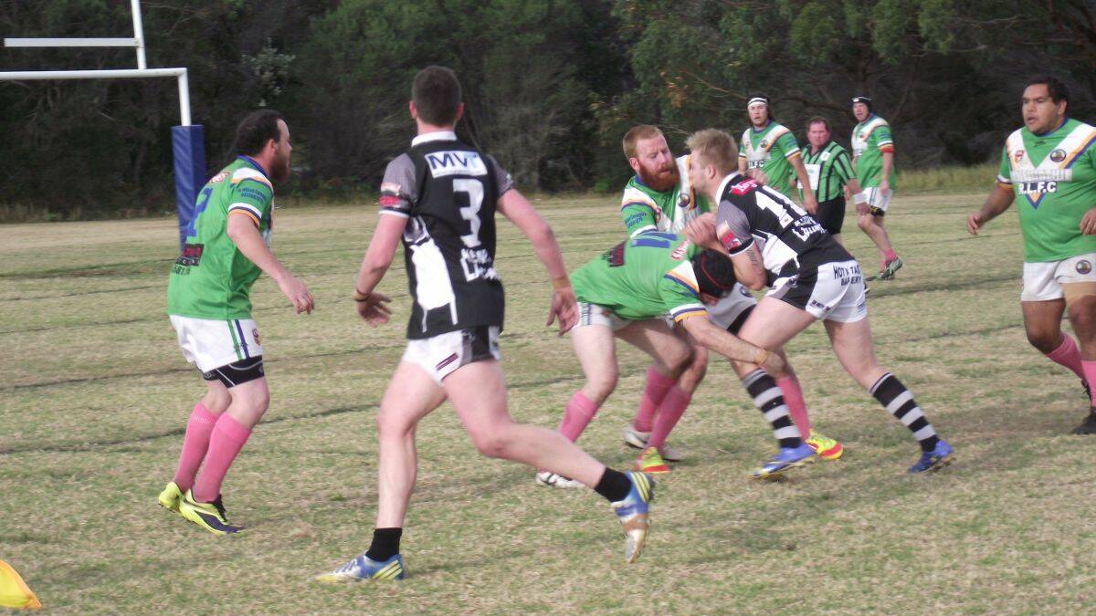 Mixed fortunes: Lower Macleay Magpies welcomed back captain-coach Luke Dufty (wearing striped socks) at Lake Cathie Raiders, but it was not enough to hold off the hosts’ late turnaround. Picture supplied.