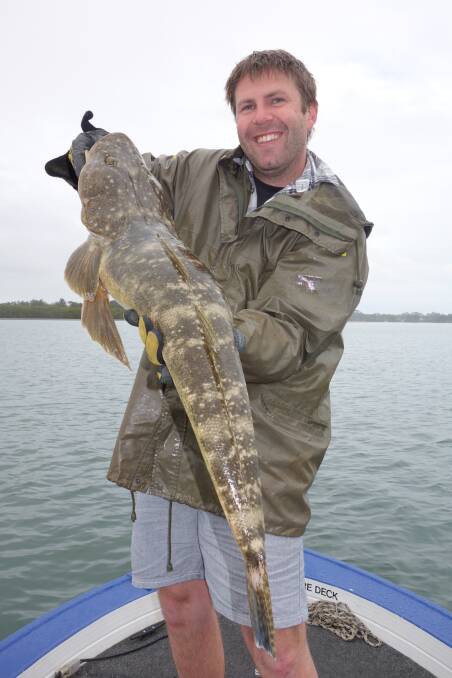 Trip worth it for the catch: Sam Powell recently caught and released this terrific flathead during a trip up the Hastings with Castaway Estuary Charters.