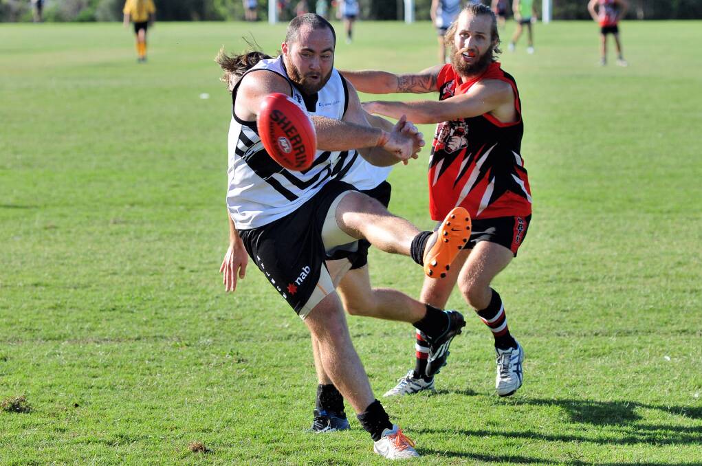Matt Lill kicks a goal for the Port Macquarie Magpies on Saturday. Pic: MATT ATTARD