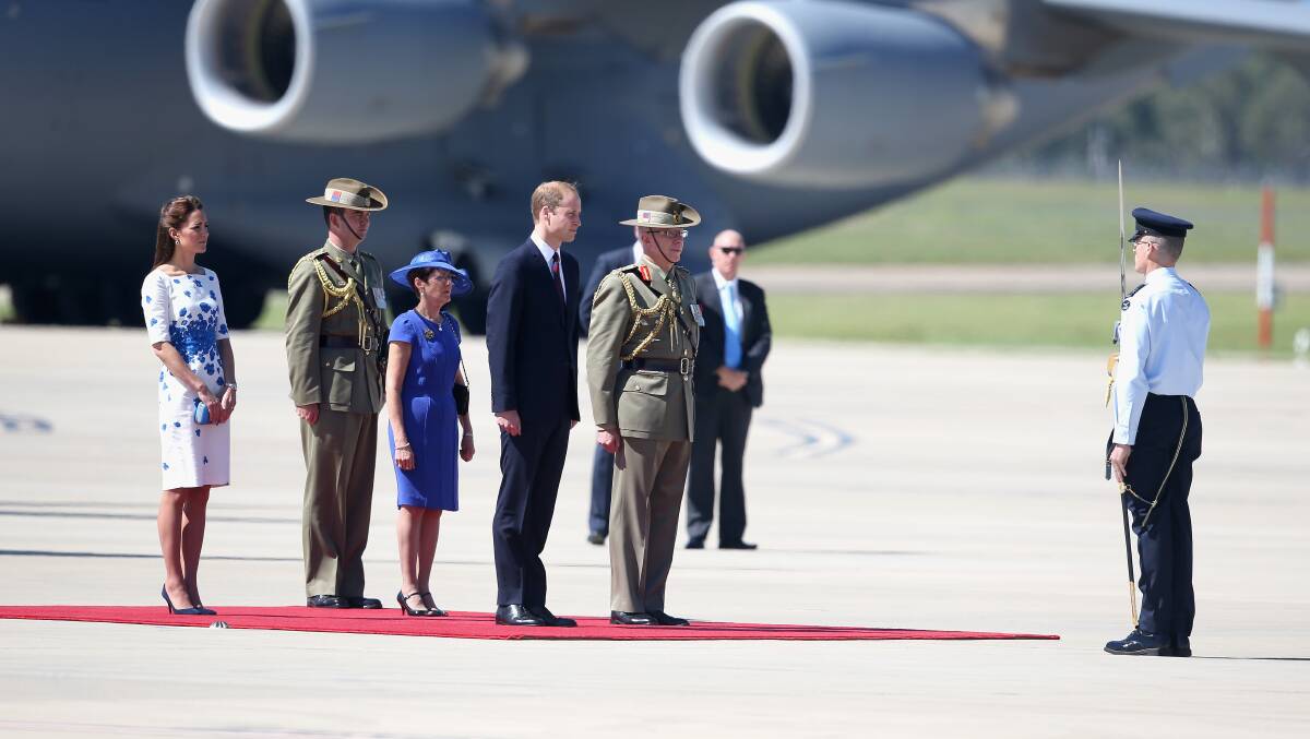 Prince William, Duke of Cambridge and Catherine, Duchess of Cambridge arrive at the Royal Australian Airforce Base at Amberley on April 19, 2014 in Brisbane, Australia. Photo: Getty Images.