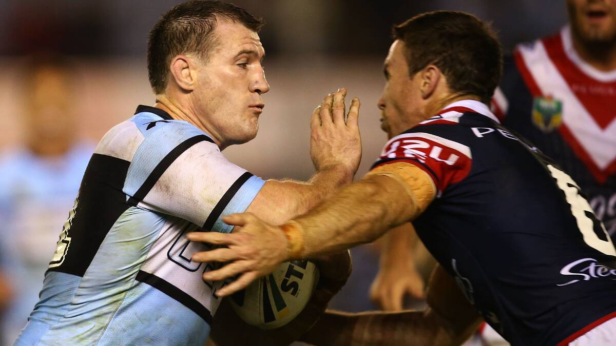 Paul Gallen of the Sharks runs the ball during the round seven NRL match between the Cronulla-Sutherland Sharks and the Sydney Roosters at Remondis Stadium on April 19, 2014 in Sydney, Australia. Photo: Mark Nolan/Getty Images.