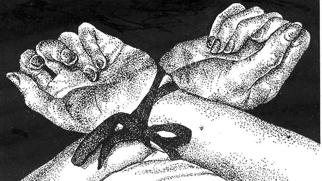 The hands of Elizabeth Dixon tied together with a bow. 
