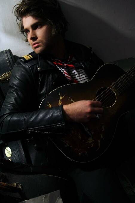 Leather man: Rock singer Dean Ray sings some of his new material at North Haven Bowling Club on Saturday.