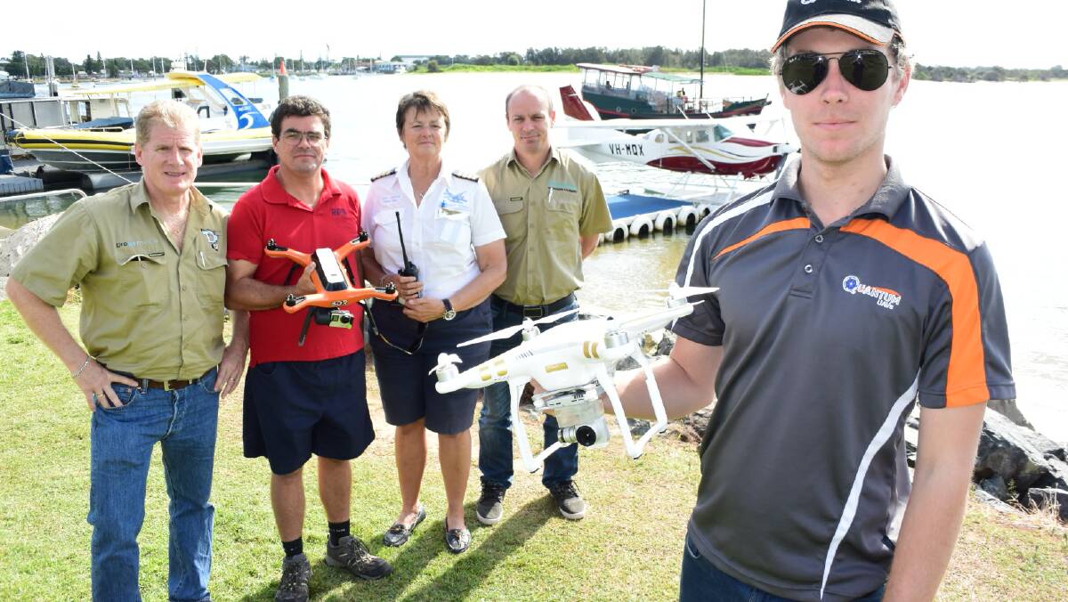 Safety is key: Drone operators Randy Bable, Steve Keep, Steve Pelepczuk and Tim Hitchens along with seaplane pilot Judy Hodge.