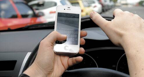 Tougher demerit points for mobile phone use