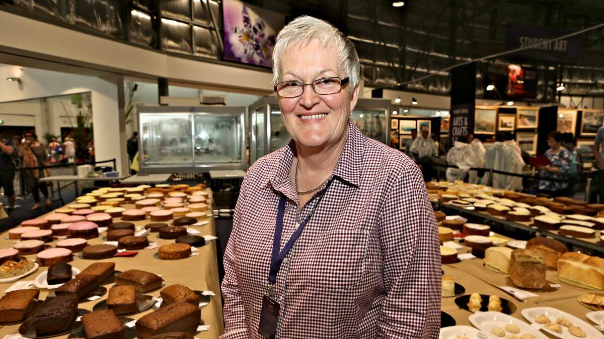 GRIFFITH: Barbara Goldman who entered 19 perishable categories and seven non-perishable categories in the cake competition looks over her competitors' creations at the Sydney Royal Easter Show. Picture: Supplied