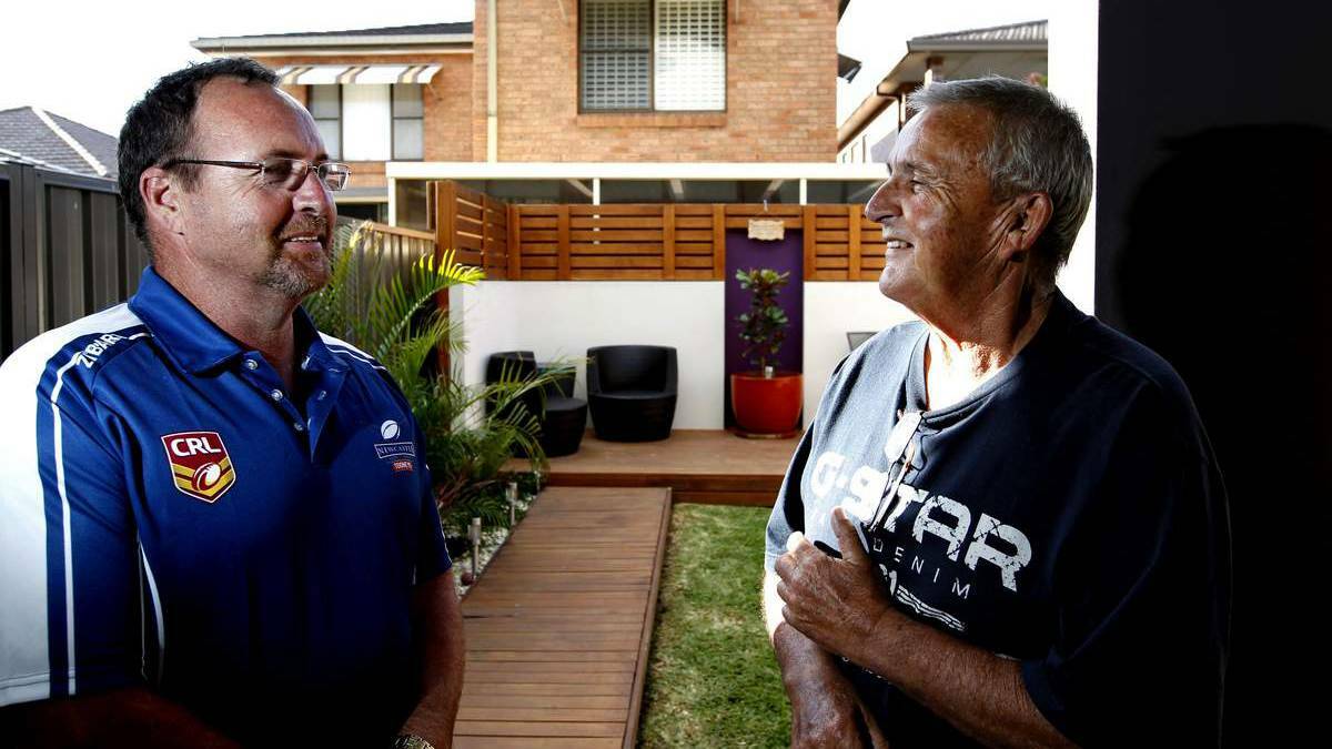 NEWCASTLE: David Watson, left, checks in on his CPR recipient Tom Trow, who came home from hospital on Thursday. Mr Watson performed CPR on Mr Trow for 20 minutes last week after he went into cardiac arrest at a football match. Picture: Simone De Peak/Newcastle Herald