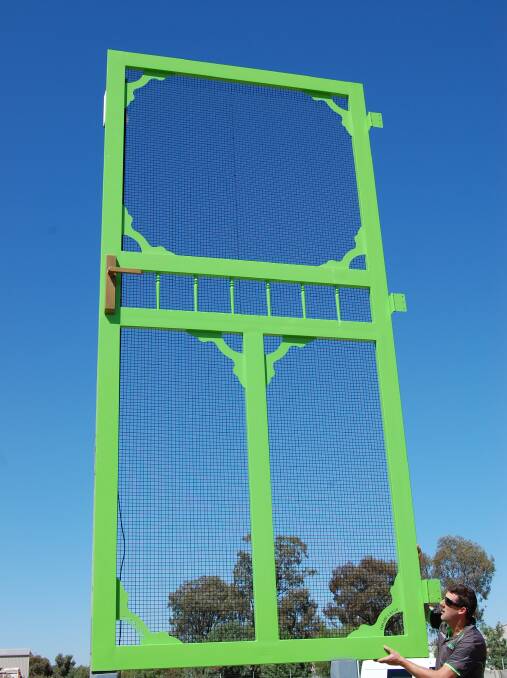 World record looms large over Bendigo as Windridge Security Doors makes a whopping 5m-high security door.