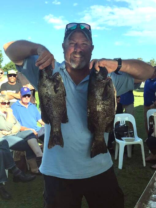 FISHING FOR A CAUSE: Fishos, like local identity Col Treneman, will do what they love to raise funds for two local causes. PHOTO: Lake Cathie Amateur Fishing Club's Facebook page.