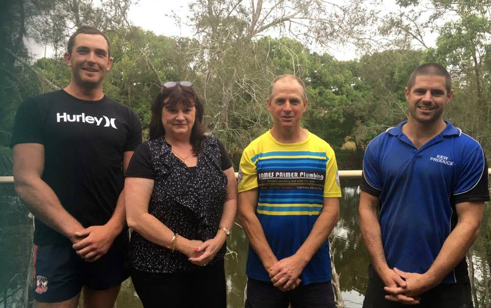 TEAM LEADING THE BLUES: Pictured from left Beau Kettle (captain/coach), Carol Hardy (sponsor Kendall Services and Citizens Club), Wayne Wilkes (Blues president), Dustin Prosser (assistant coach).