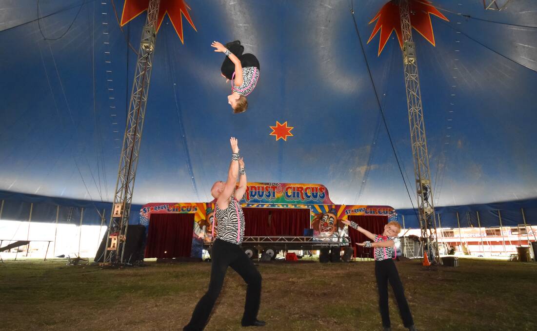 Flying high: The exciting acrobatics team of Cassius, Gene and Wyatt will wow the audience at Stardust Circus. Photo: Ivan Sajko