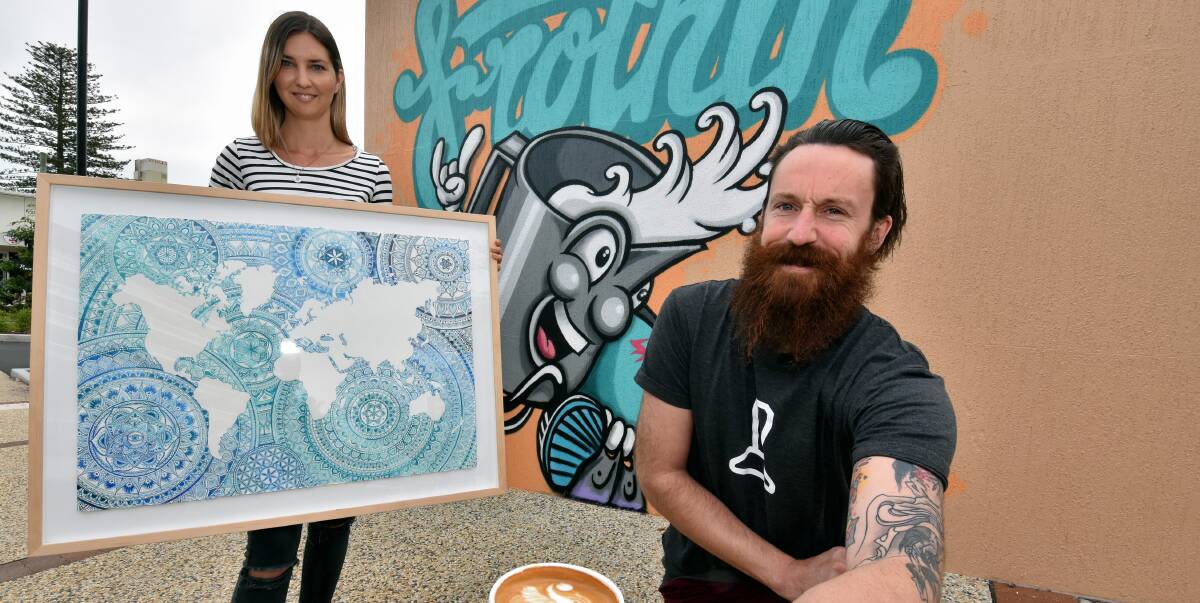 Art of all forms: Local artists Kara Walsh and Simon Luxton outside of Four Espresso. Kara specialises in intricate mandala while Simon is a barista and cartoon-style artist. Photo: MATT ATTARD