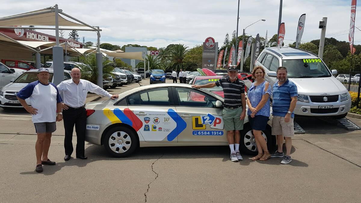 Learn safely: The team from Port Macquarie Neighbourhood Centre and Port Macquarie Holden are urging sign ups for the L2P Learner Driver Mentor program.