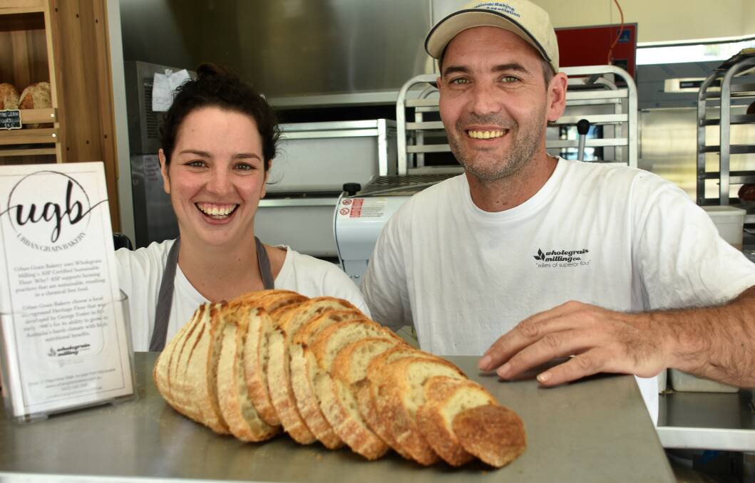 You beauty: Urban Grain Bakery owners Catherine Jugmans and Tim Dunn with their award winning sourdough loaf. Photo: Matt Attard