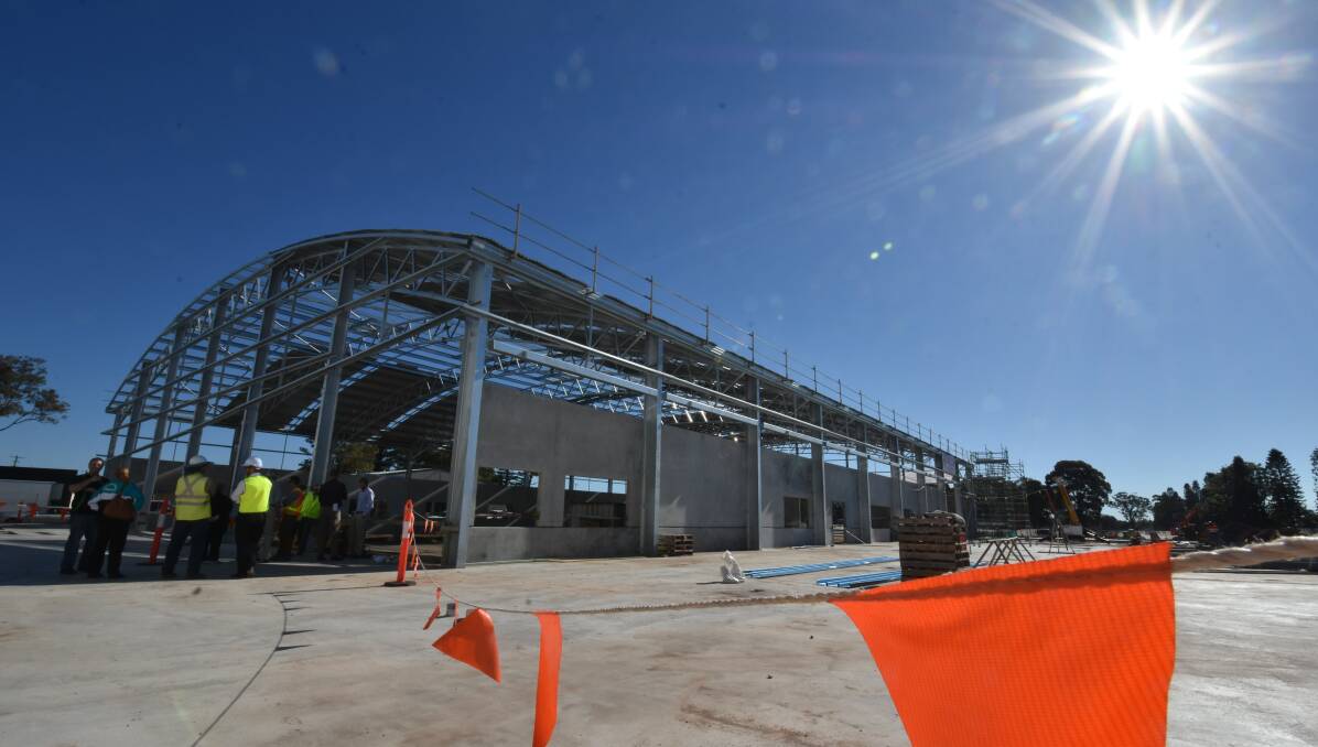 Impressive work: Construction is half done on the Port Macquarie-Hastings Regional Indoor Stadium expansion with works expected to be completed by Christmas. Photo: Matt Attard
