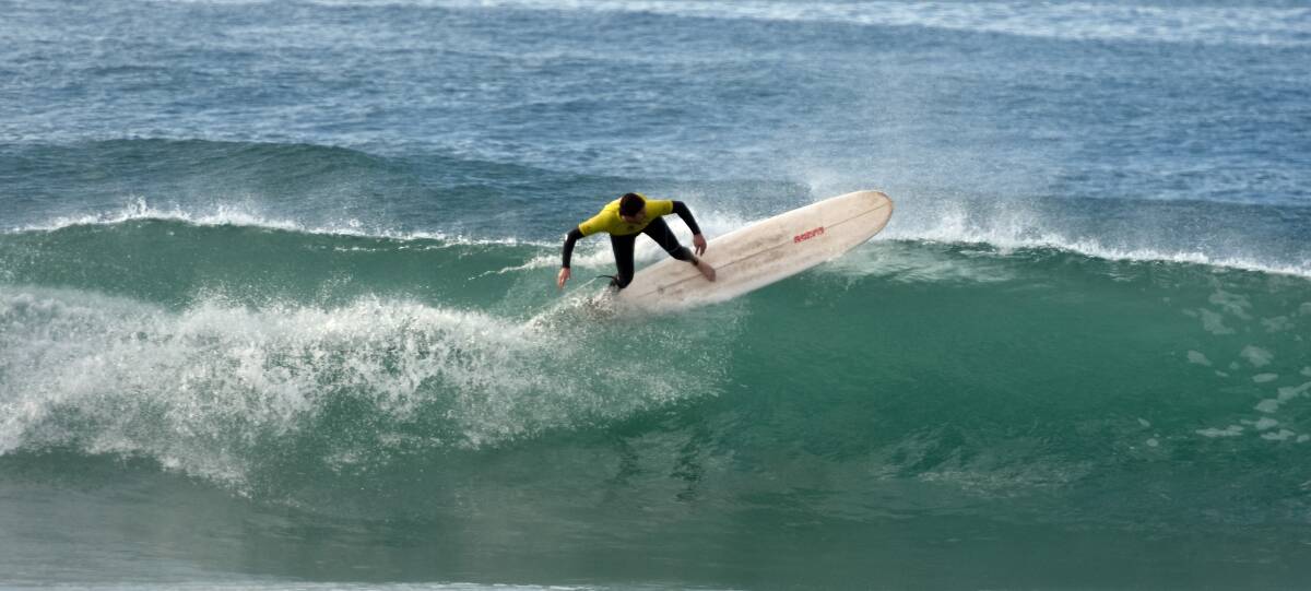 Horizontal: William Crowe during the NSW Longboard Titles on the weekend.