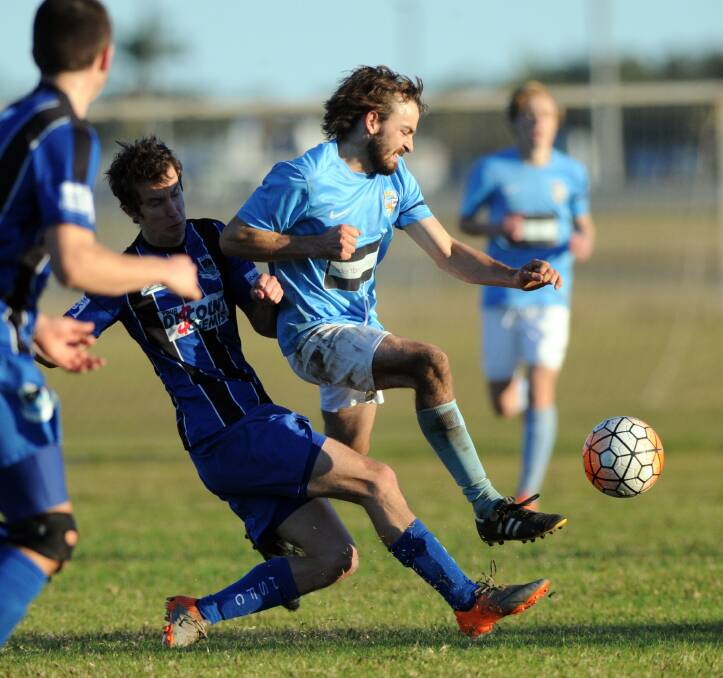 Always fighting: Aaron Grose in action for Port FC earlier in the season. Coach Mick Brown is proud of his team, despite some heavy losses.