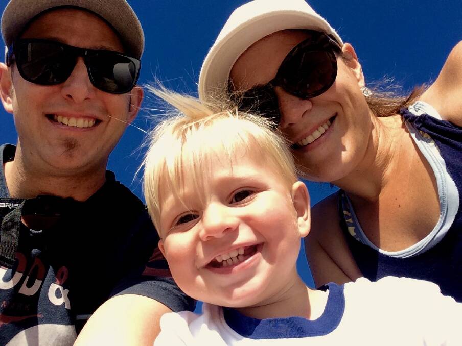 Austin and his parents, Nathan and Alana Roper. He is battling acute lymphoblastic leukaemia.