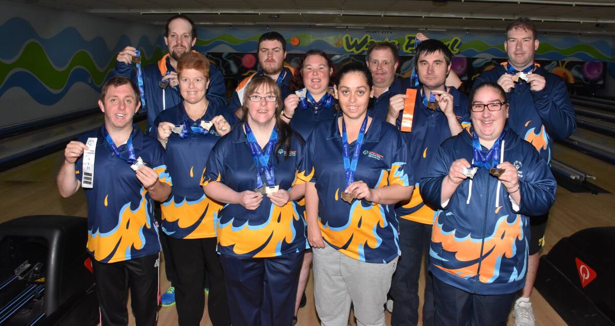 A big haul: Our Special Olympic ten pin bowlers have returned from competition with a big haul of medals. Photo: Ivan Sajko.