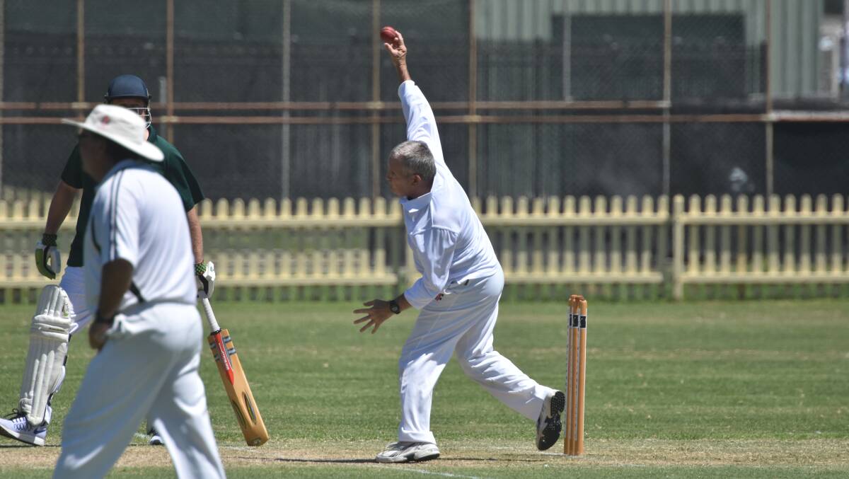 Well bowled: Gary Whale with a nice off spin bowl during his team's match at Oxley Oval.