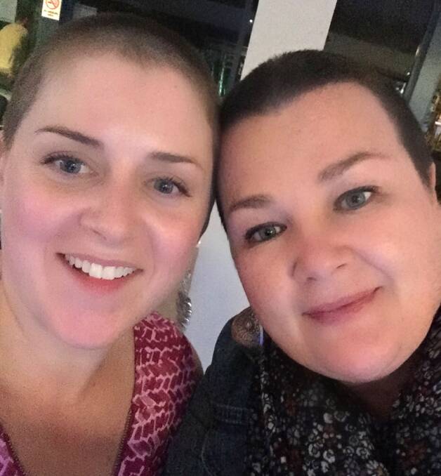 Top effort: Alana Green and Tara O’Brien with their new buzz cuts. They shaved their heads to raise money for a family member and the local cancer oncology trust.