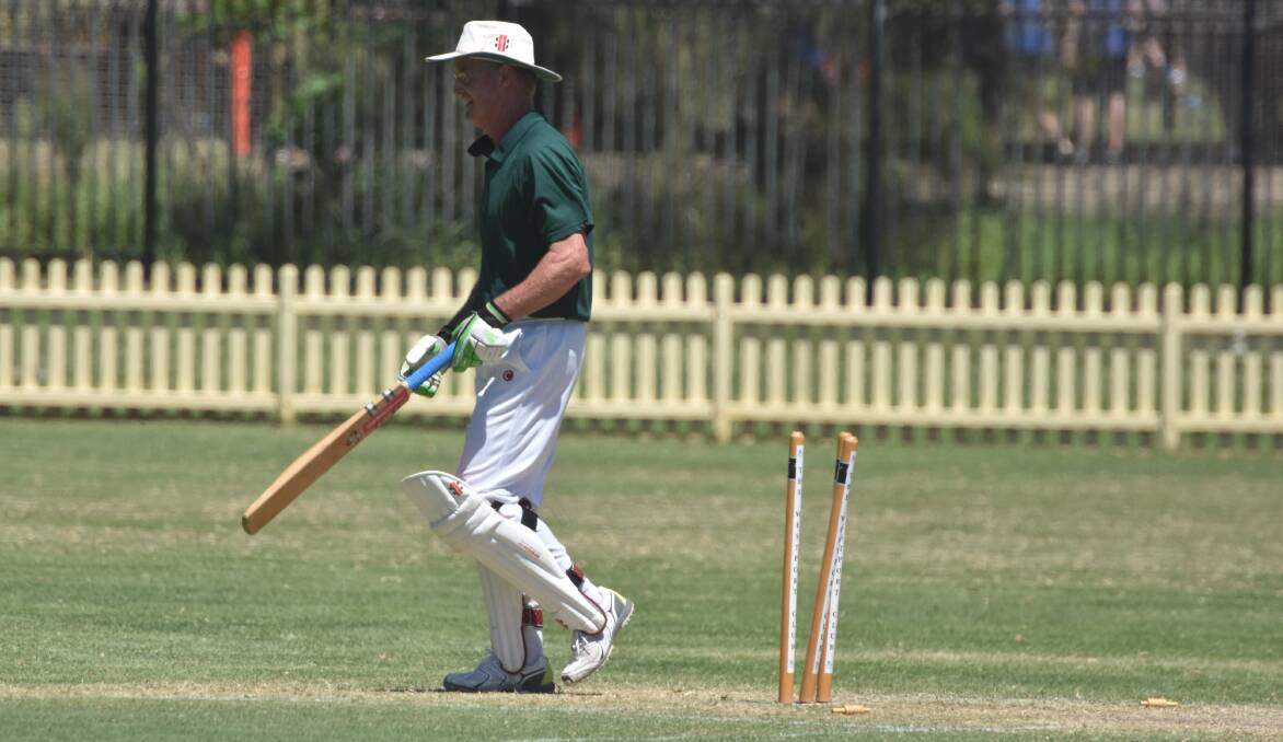 He's got him: Craig Stoddart is clean bowled and makes his way from the pitch at Oxley Oval.