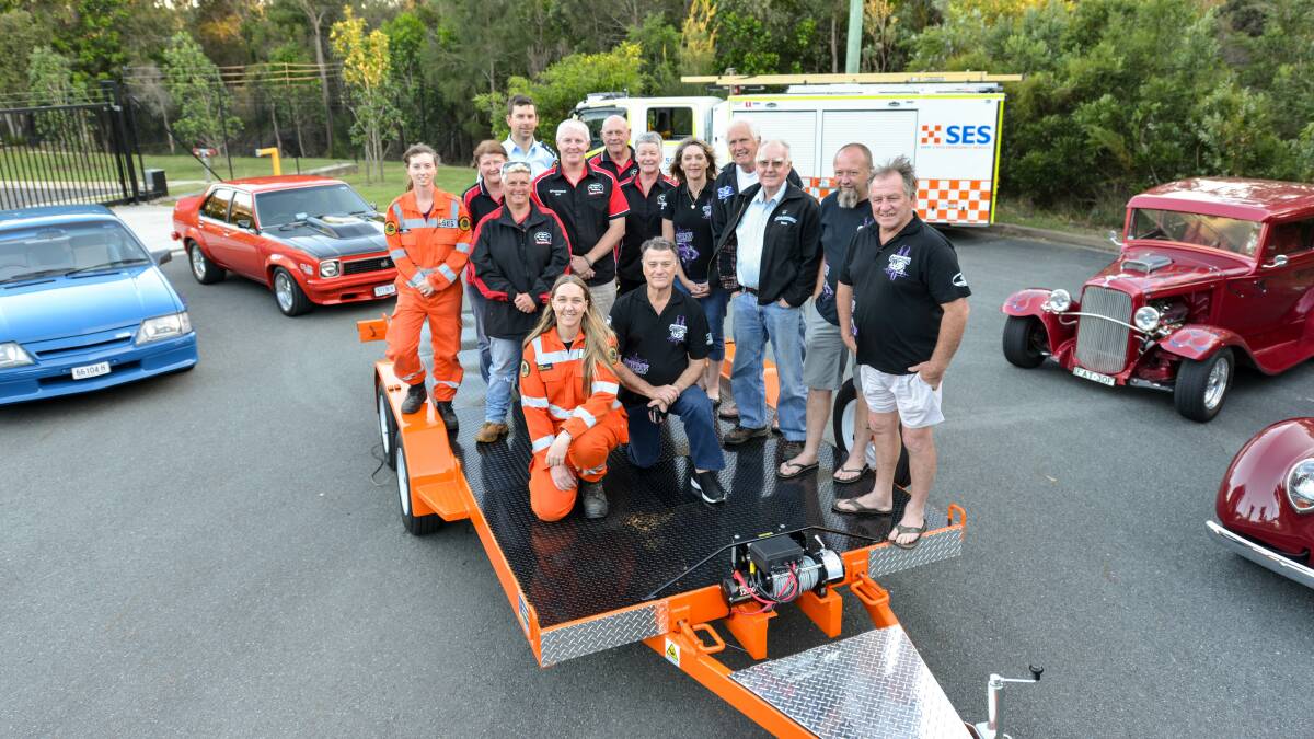 All aboard: The new trailer with members of both clubs and the SES. Photo: Alfred Portenschlager