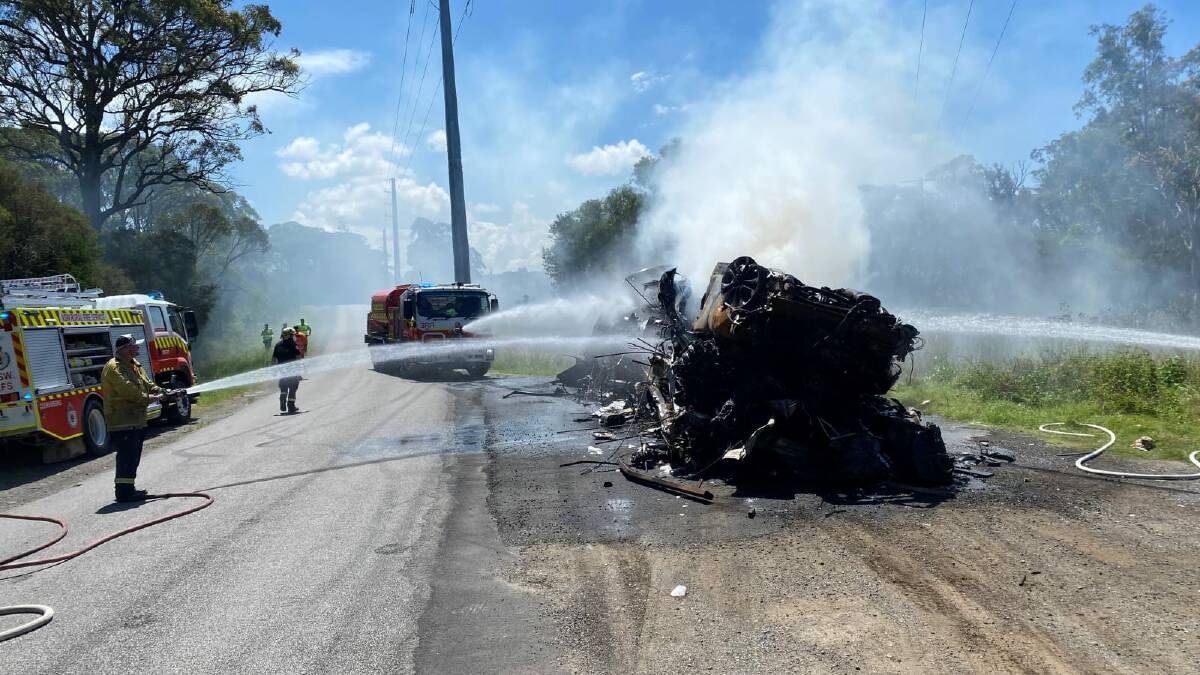 Crushed car load catches fire near Morisset, pictures supplied RFS/FRNSW