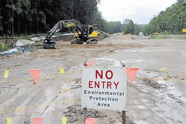 Stay out: An exclusion zone remains in place around the Pacific Highway site.